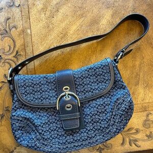 Coach purse-blue with adjustable leather strap. Excellent condition.